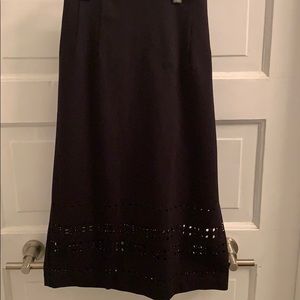 Black laser-cut pencil skirt by Amanda + Chelsea